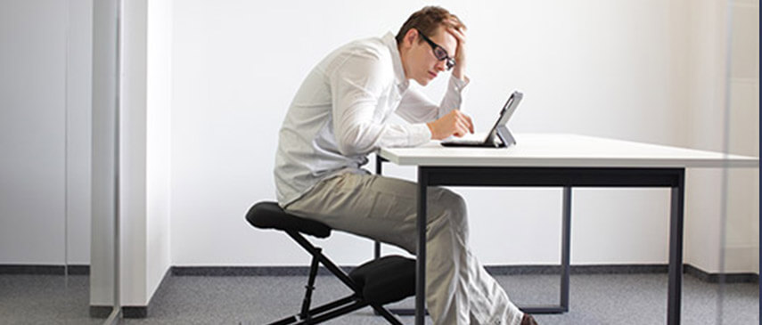 How to Protect Your Back Man slouching back-pain