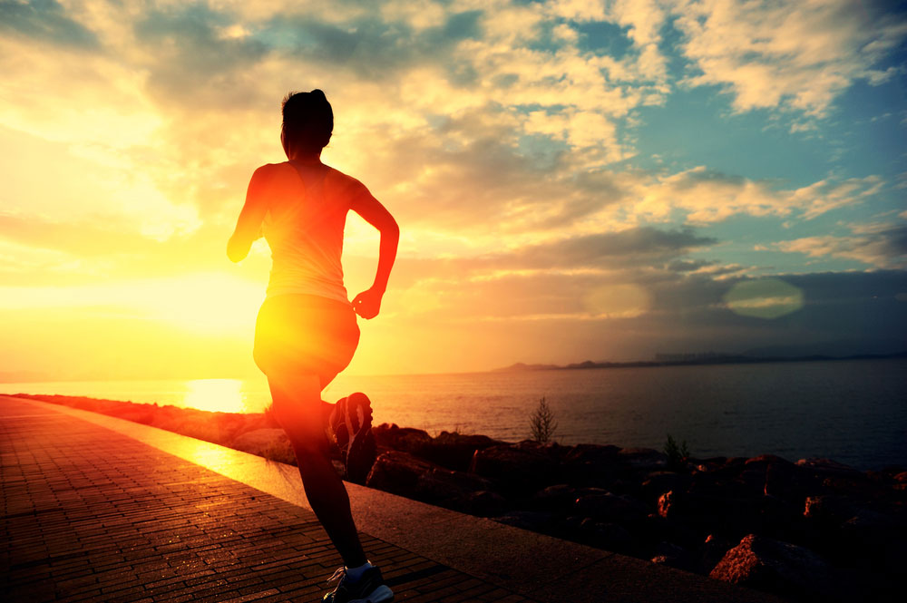 6 Tips For Handling Side Stitches Man Running Sunset SOL running_side_stiches