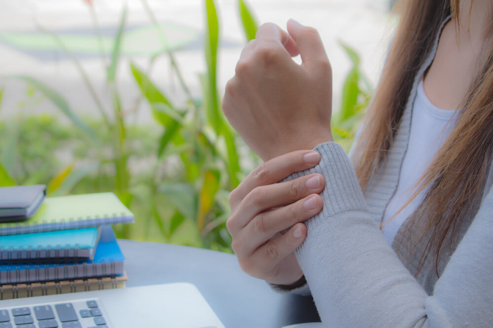 Why do I have pain on the outside of my wrist? shutterstock 731237974 pain on outside of wrist
