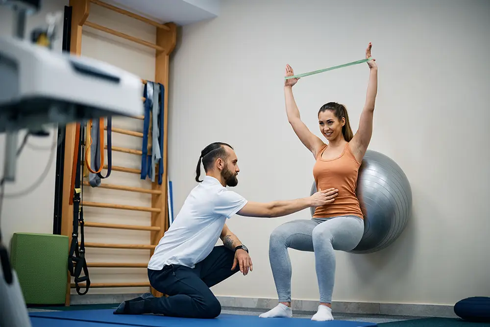6 questions to prepare for your PT school interview physiotherapist assisting young sportswoman with e 2023 11 27 05 35 48 utc 6 questions to prepare for your pt school interview uncategorized