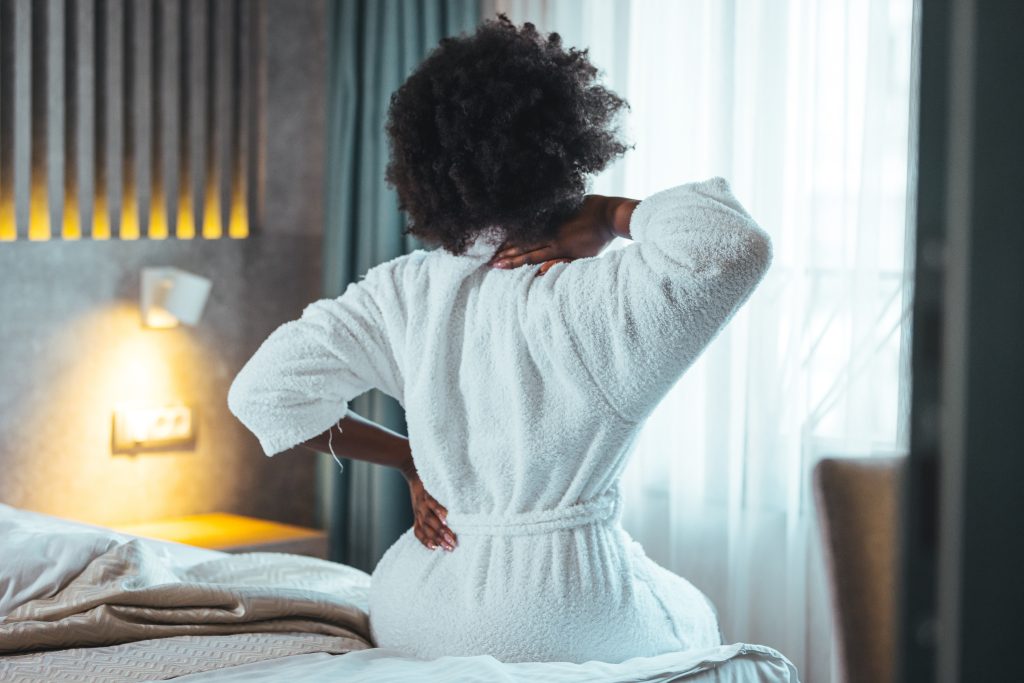 Why Does My Back Hurt When I Lay Down? AdobeStock 484415591 why does my back hurt when i lay down? back pain