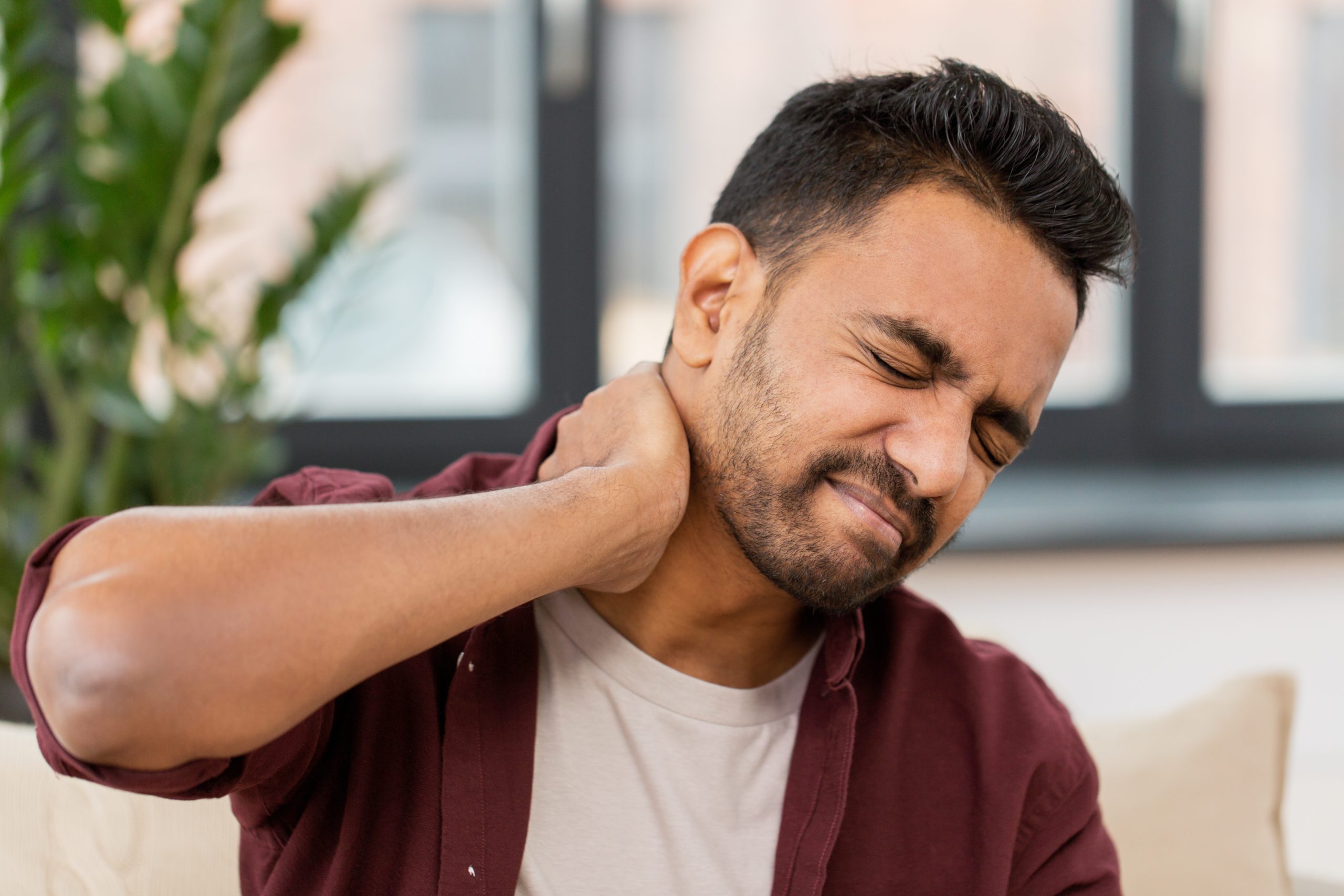 Can Neck Pain Cause Headaches? AdobeStock 184827444 scaled Can Neck Pain Cause Headaches?