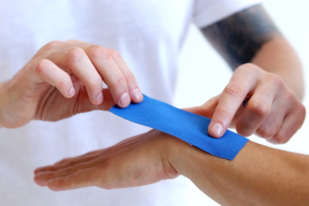 Does Kinesiology Tape for Carpal Tunnel Work? AdobeStock 454700359 does kinesiology tape for carpal tunnel work? carpal tunnel syndrome
